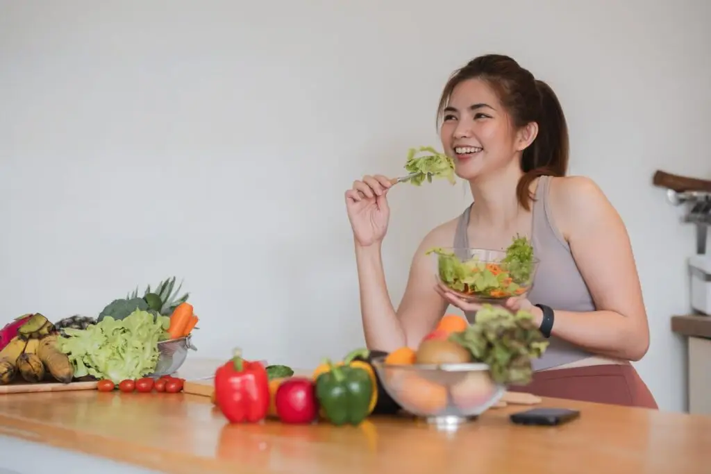 Woman Eating Salad